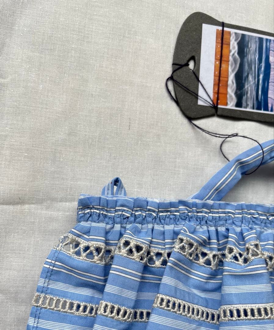 エバゴス ボーダーレースストライプヨコナガポーチ