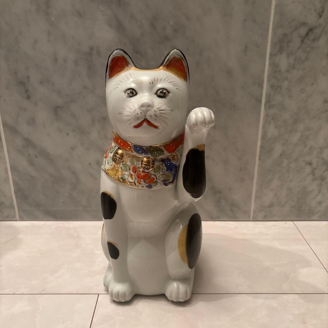 アンティーク　神秘的な瞳でとても雰囲気のあるお金や良き人を招く招き