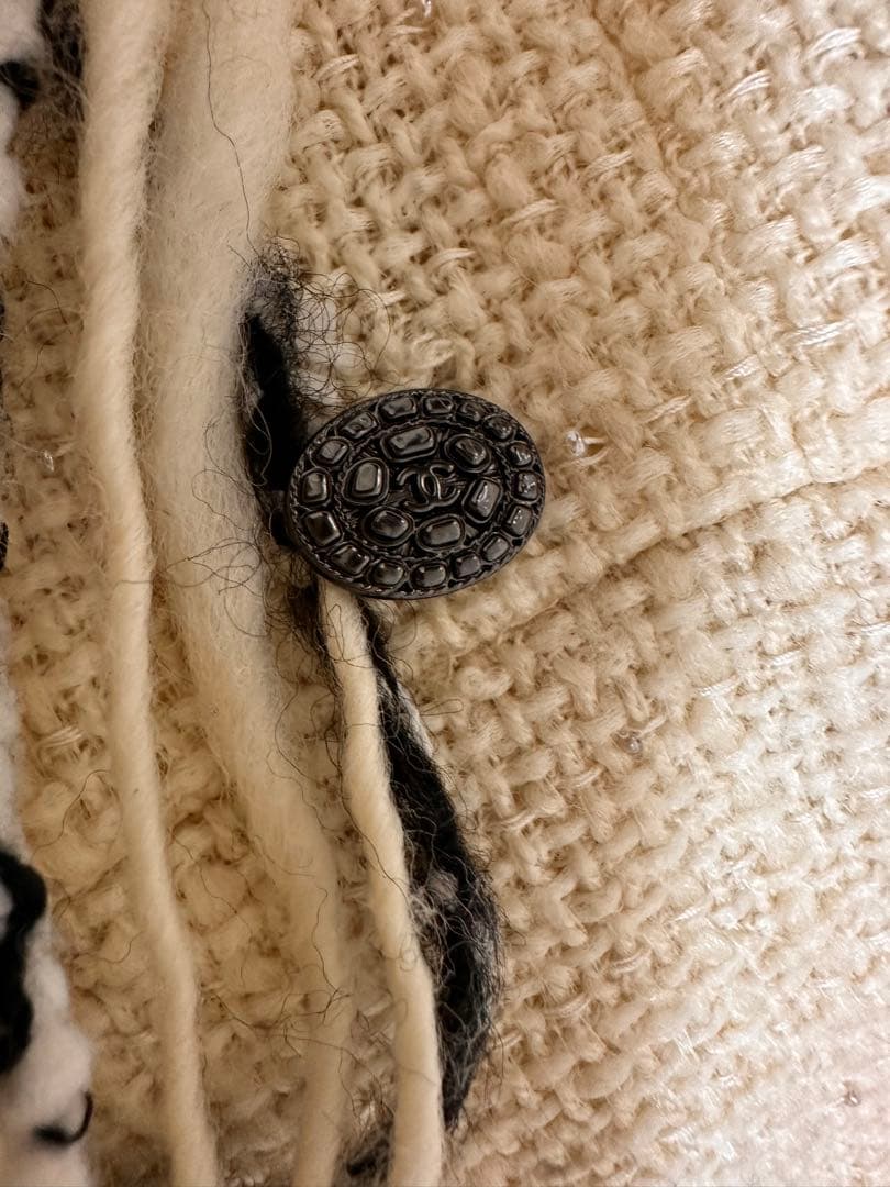 CHANELフリンジ付きクリーム色ニットワンピース