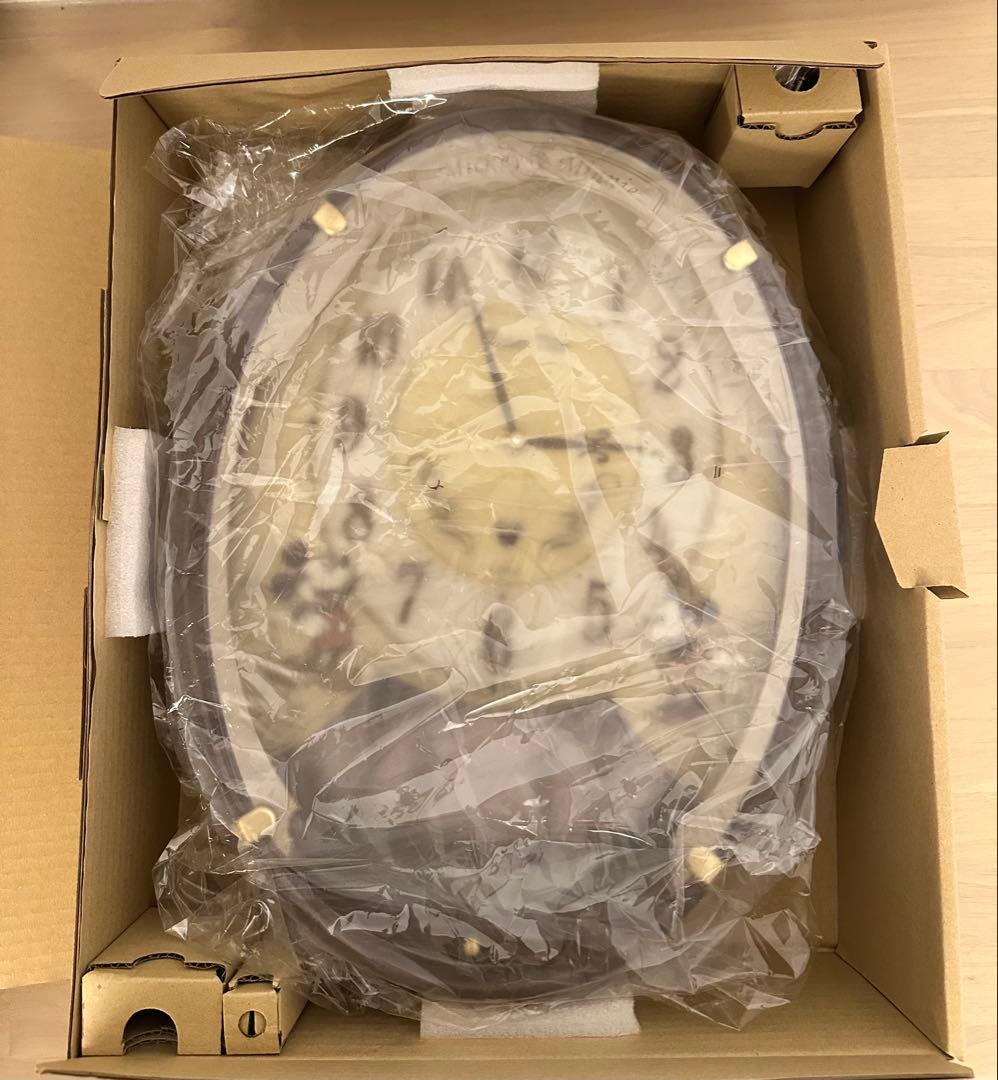 ミッキーとミニー シルエットの飾り振り子が魅力 メロディ付き掛時計 FW579B