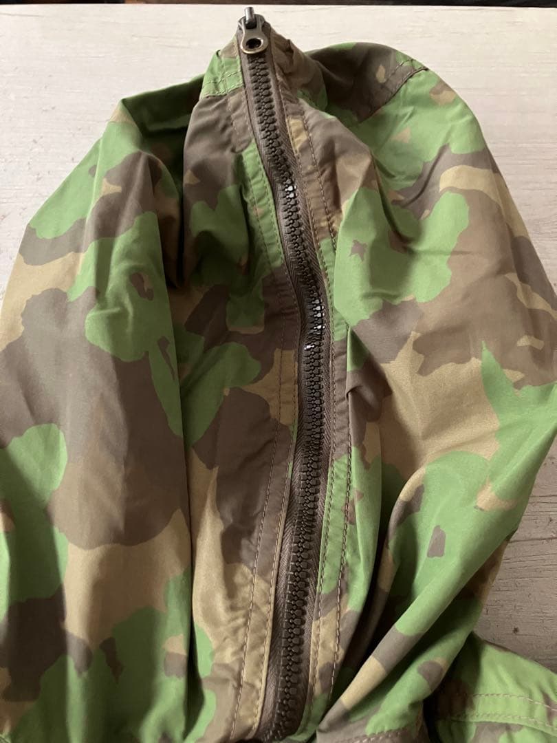 ミュベールワーク×デュベティカ フラワー迷彩フード付きミリタリージャケット