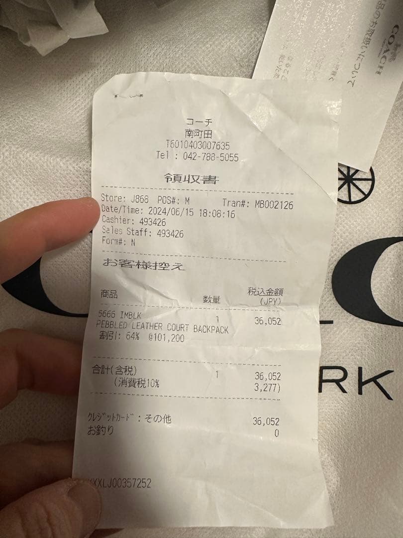 バッグ COACH PEBBLED LEATHER COURT BACKPACK