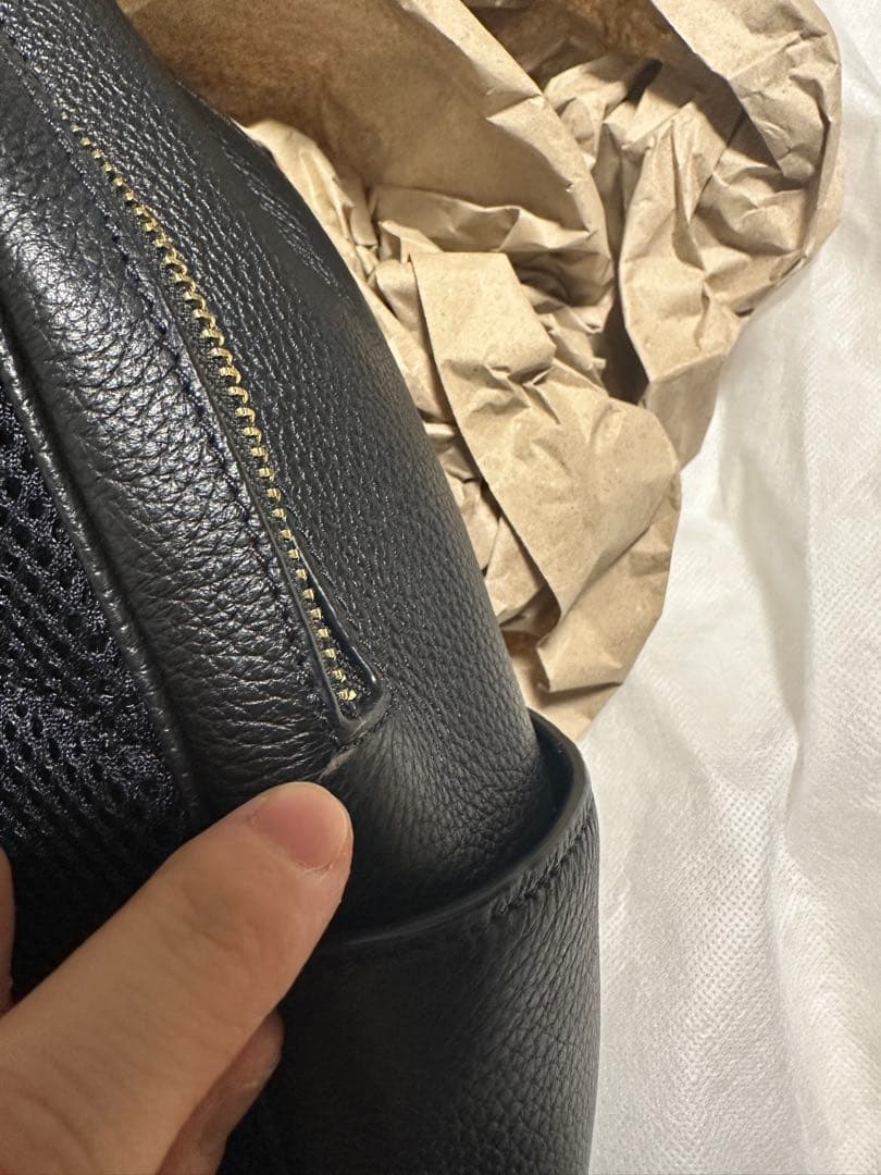 バッグ COACH PEBBLED LEATHER COURT BACKPACK