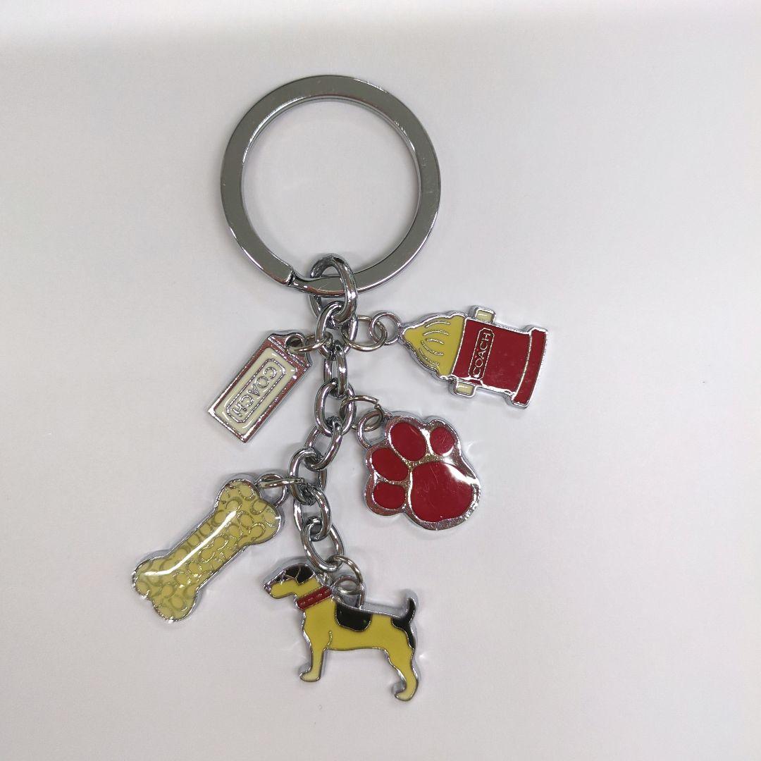 コーチ COACH キーホルダー 犬 赤 黄色 - メルカリ