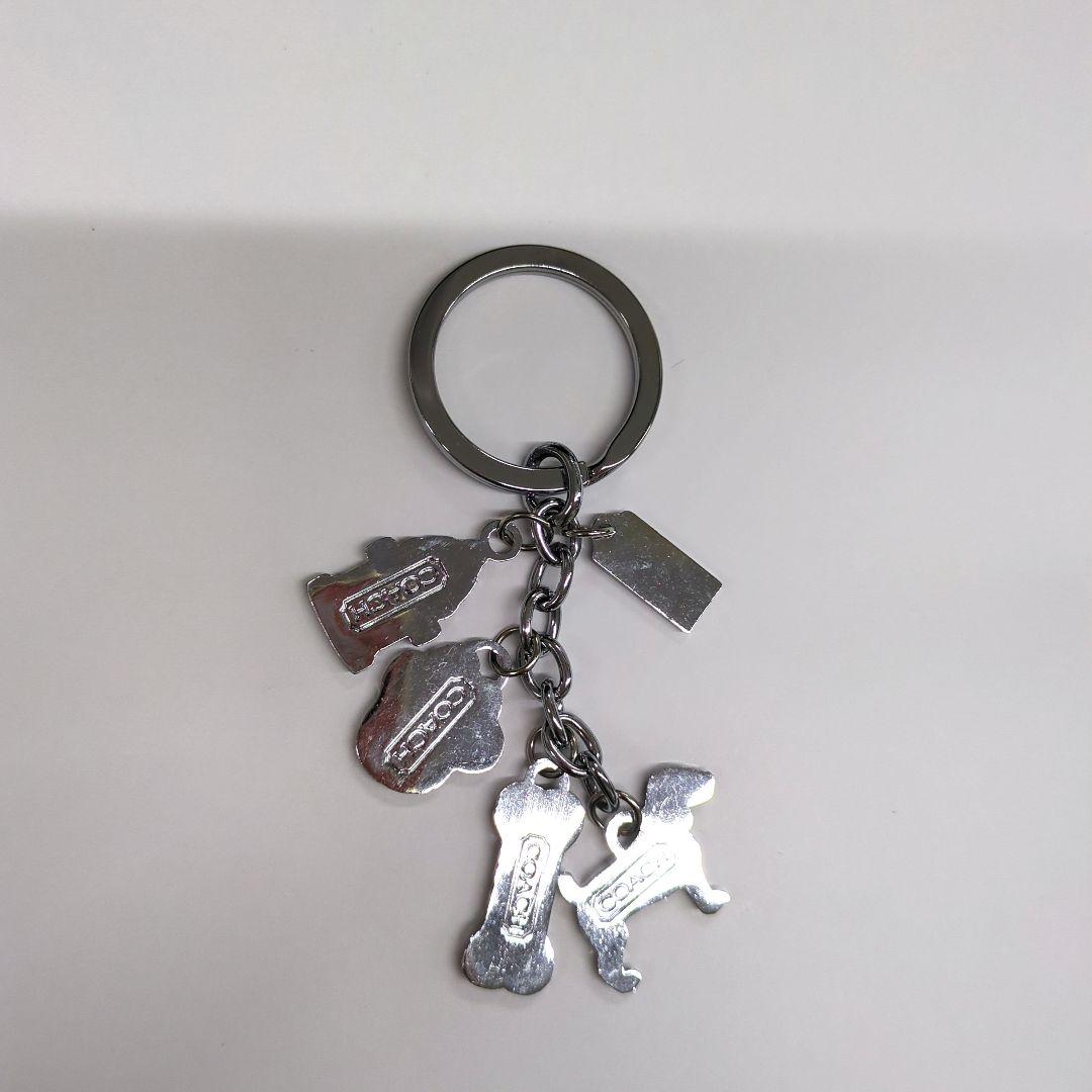 コーチ COACH キーホルダー 犬 赤 黄色 - メルカリ