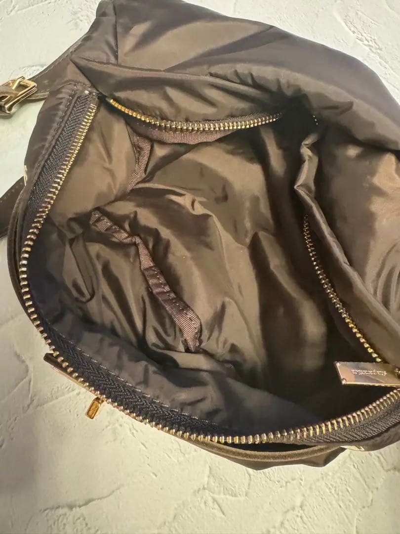 sia parantica ボディバッグ ブラウン