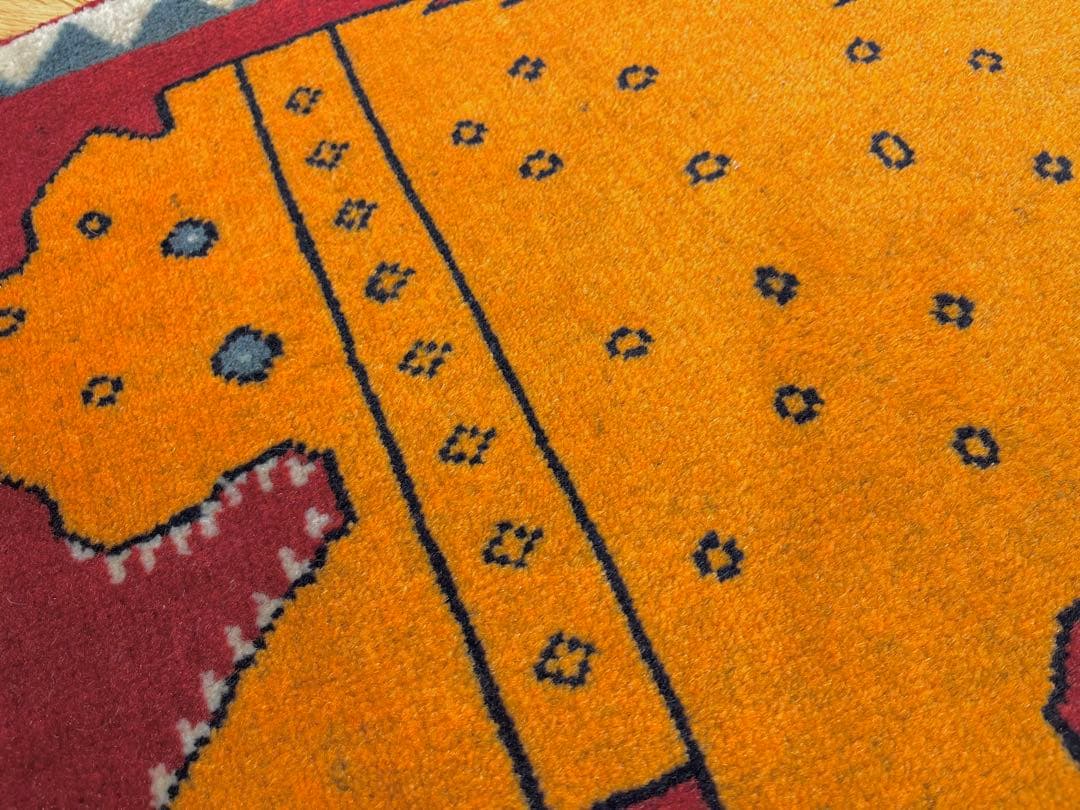 トライバルラグ　アマレバフト　95×65 茜色　ライオン