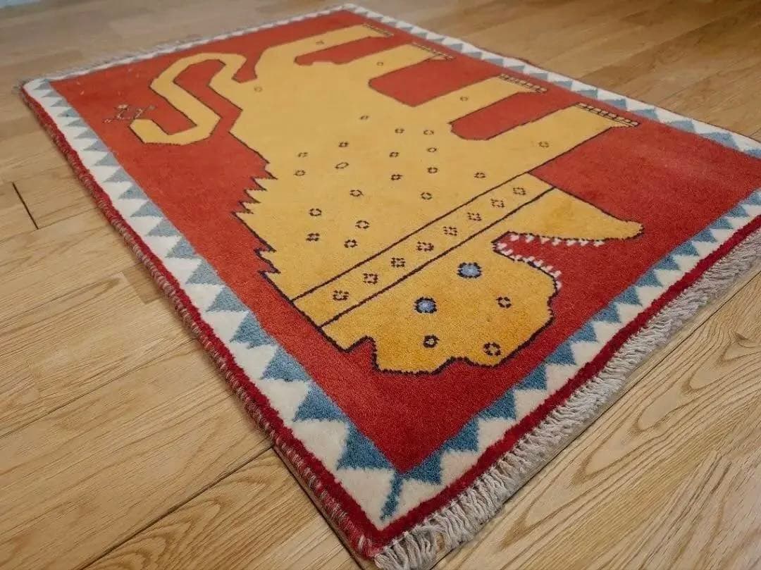 トライバルラグ　アマレバフト　95×65 茜色　ライオン