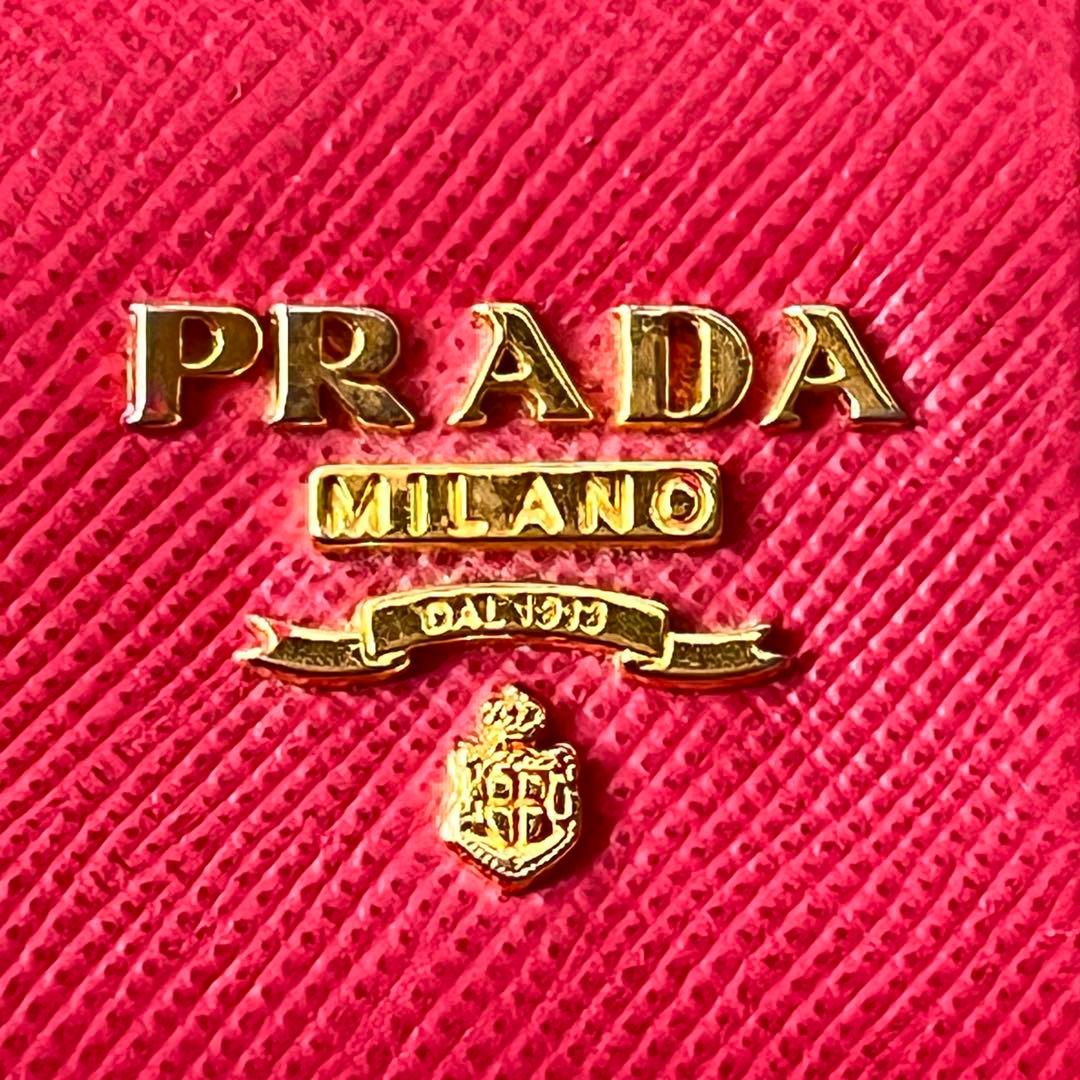 美品✨プラダ　L字ファスナー　サフィアーノ　長財布　フィオッコ　リボン　ピンク