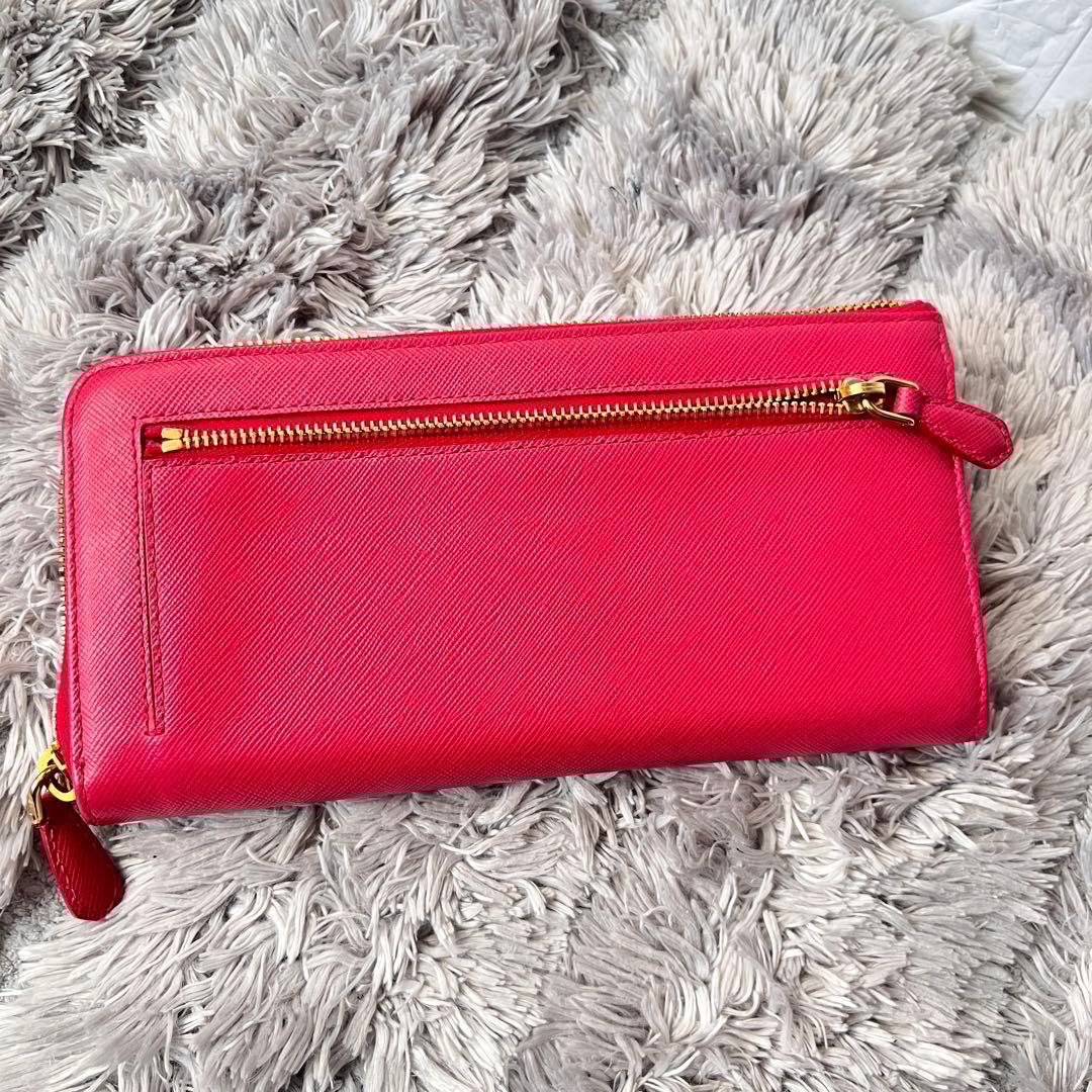 美品✨プラダ　L字ファスナー　サフィアーノ　長財布　フィオッコ　リボン　ピンク