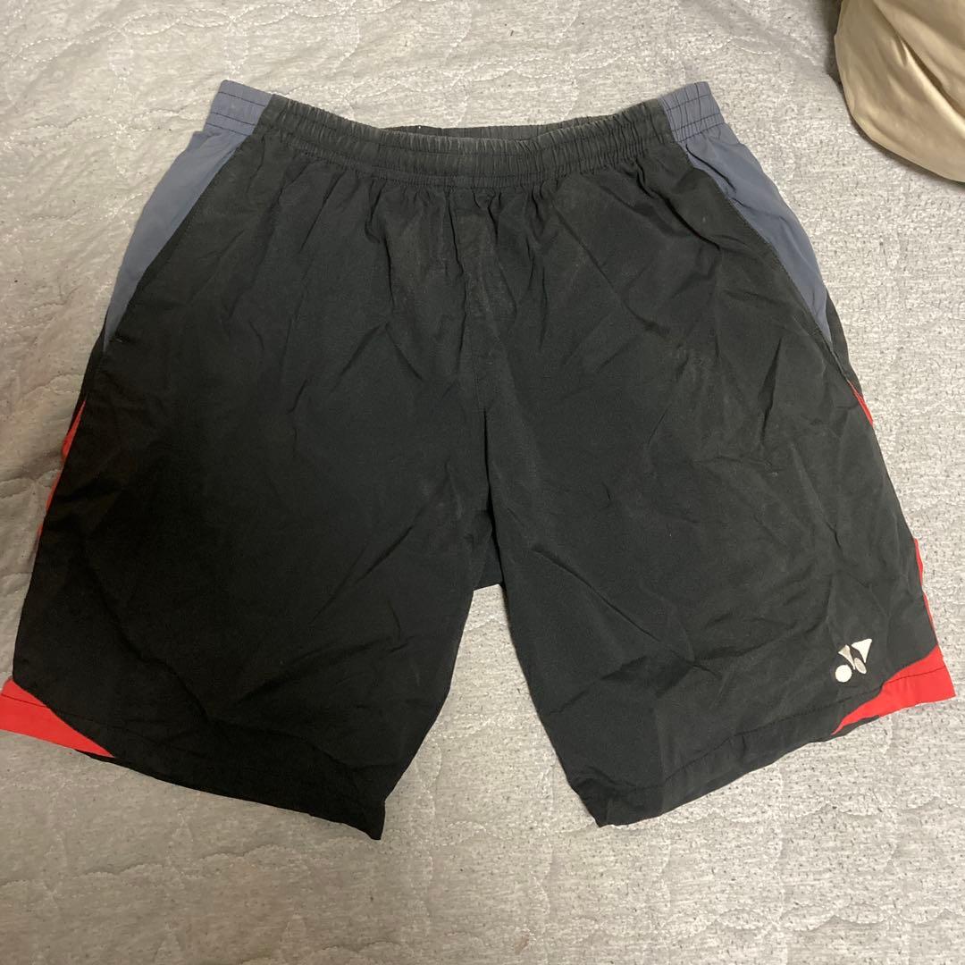 YONEX バドミントンパンツ 黒赤 - メルカリ
