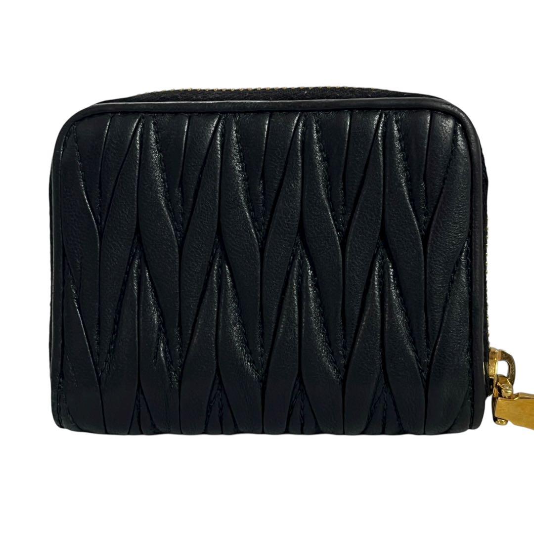 希少✨ミュウミュウ ケース ファスナー マトラッセ ロゴ金具 ブラック