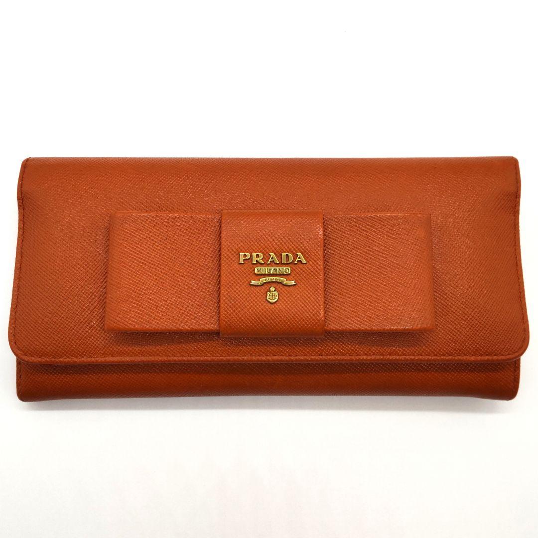 プラダ サフィアーノ フィオッコ リボン 長財布 オレンジ パスケース付き