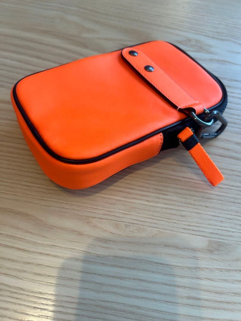 新品】COACH ポーチ メンズ 小物入れ オレンジ