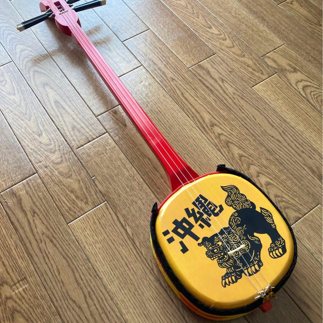 シーサー柄三線（戻らないカラクイ付き）