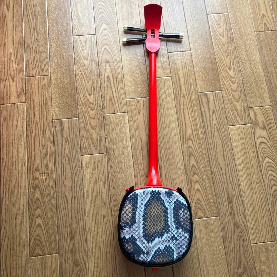 シーサー柄三線（戻らないカラクイ付き）