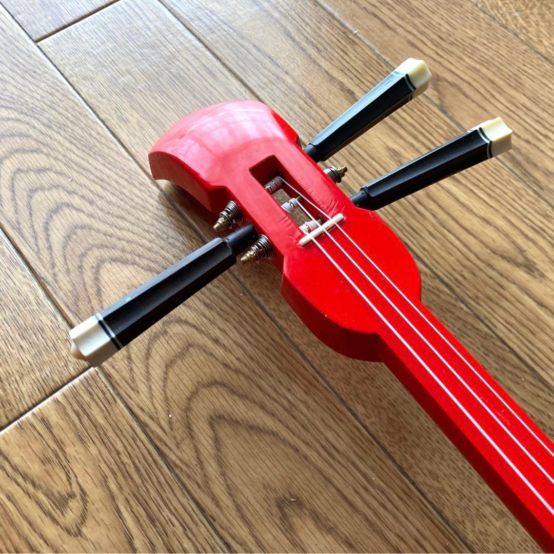 シーサー柄三線（戻らないカラクイ付き）