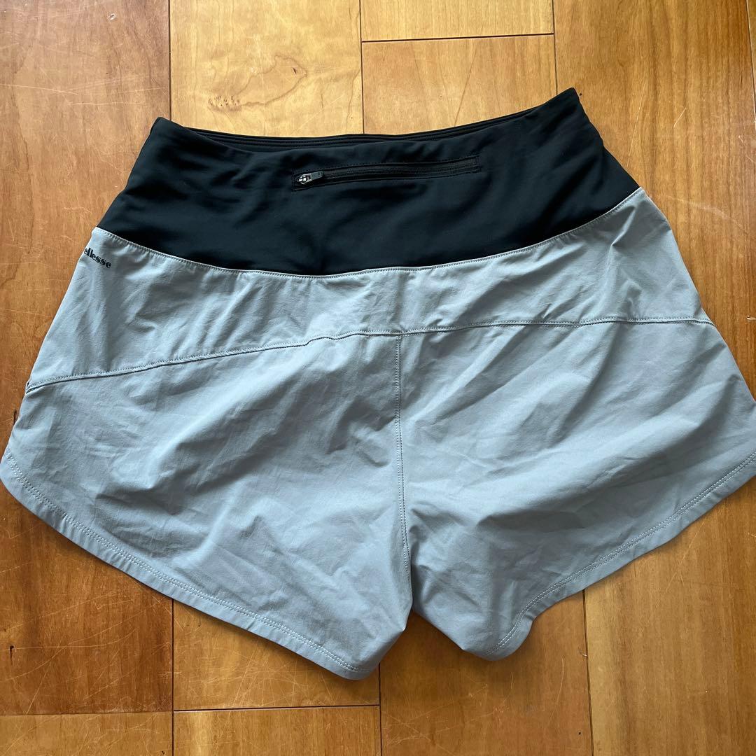 ellesse】ストレッチウーブンショートレングスショーツ（レディース