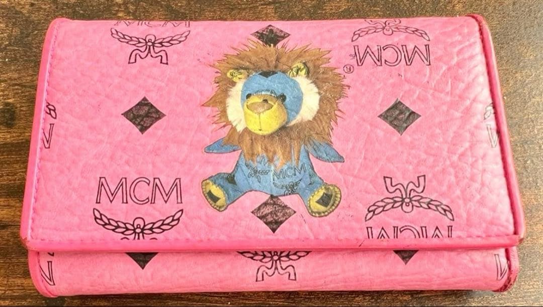 MCM 3つ折り財布 ピンク ライオン - メルカリ