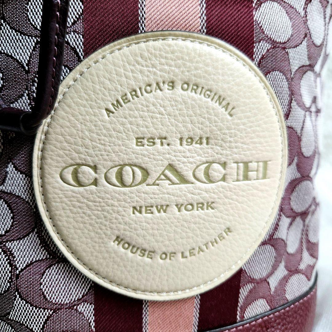 新品未使用　コーチ　デンプシー　本革　リュック　シグネチャー　ワインレッド